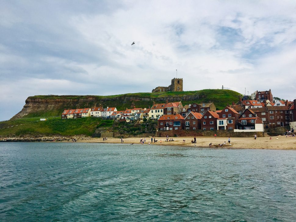 Whitby town overlooking sandy beach
