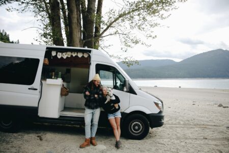 couple with a god travelling in a motorhome 